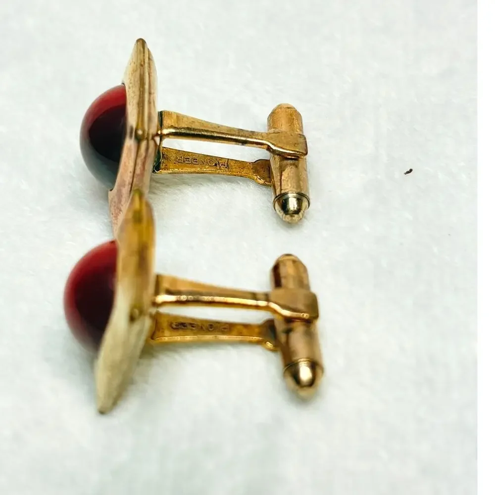Vintage Pioneer Gold‑Tone Cufflinks with Ruby Thermoset Domes, 1960s–70s